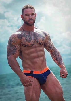 Muscular, awesome pecs, sexy man and great ink work - WOOF