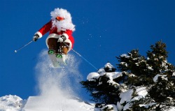 magicalnaturetour:  Santa skis ~ ‘Photo credit: Stefano Rellandini / Reuters :)