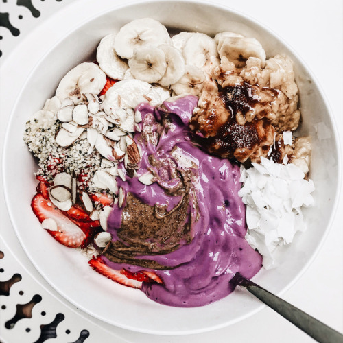 jessicasodenkamp: Oatmeal bowl topped with dairy-free blueberry yogurt, almond butter, hemp seeds, s