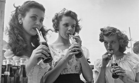 forties-fifties-sixties-love: Three teenage girls drinking bottles of soda, 1956 