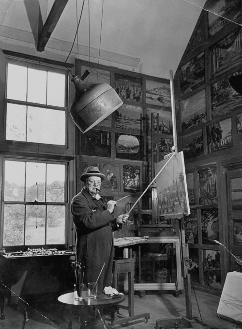 Sir Winston Churchill in his art studio.