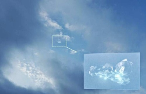 unexplained-events:Man from Vienna, Austria notices something strange floating in the clouds for abo