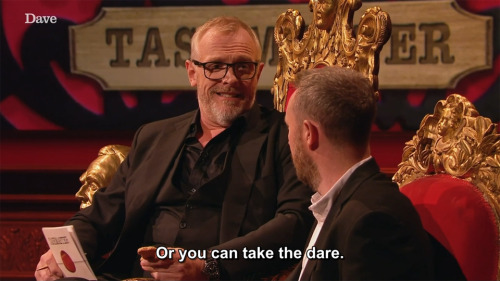 taskmastercaps:[ID: Four screencaps from Taskmaster. Greg Davies is seated next to Alex Horne, holdi