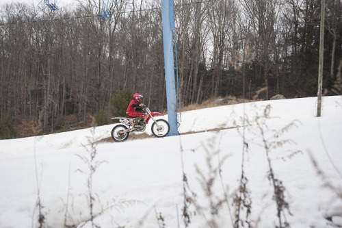 Racers fighting their way up the snow. Appalachian Moto Jam. 
