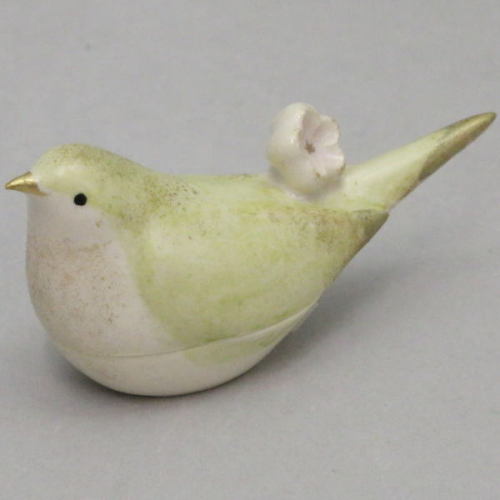 A Kyouyaki (Kyoto ware) tea utensil in the shape of a bush warbler with a plum blossom on its back. 