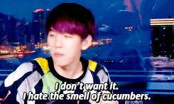 chan-soo:   Byun Baekhyun forever struggling with his food (╯°Д°）╯cucumber
