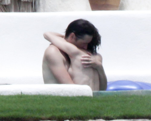 toplessbeachcelebs:  Milla Jovovich (Actress) in a jacuzzi topless in Los Cabos (August 2011)