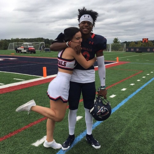 interracialaesthetic: Black athlete and white cheerleader, a classic pairing.