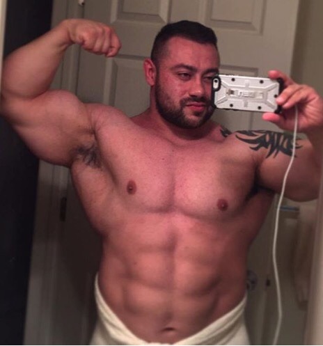 bighugeguys:  timovdrow:  pjsesq:  Short, dark muscle tank in a towel Beard Biceps