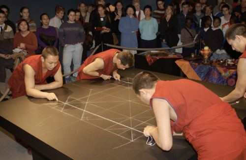 freersackler:  In response to the September 11 tragedies, twenty Buddhist monks from the Drepung Loseling Monastery constructed a sand mandala (sacred painting) at the Sackler in 2002. This seven-foot-square mandala, one of the largest ever created in