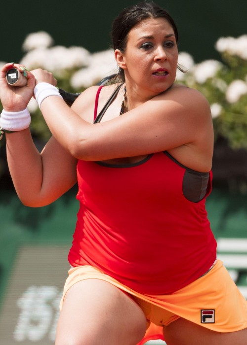 You gotta tip your cap to Marion Bartoli. Even as she packed on a slightly enormous gut, she ma