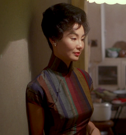 hoanbee:  Maggie Cheung wears a different cheongsam (qipao) dress in each scene of Wong Kar-Wai’s In the Mood For Love. There were 46 in all, though not all made it to the final cut. 