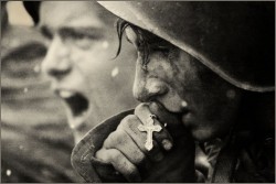 johnconley:  Russian soldiers preparing for the Battle of Kursk, July 1943. This image is especially poignant because organized religion was heavily persecuted by the hypersecular Soviet government. 