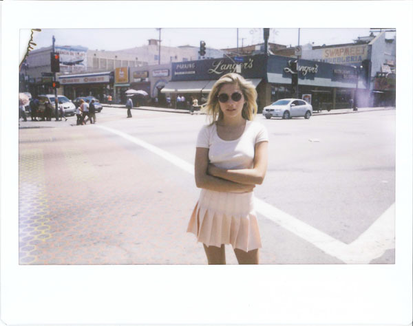 americanapparel:  Casey wearing the Baby Rib Crop Top and Tennis Skirt. Summer 2013.