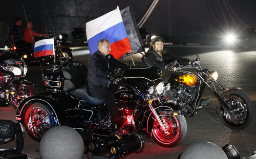 first-lady-of-russia:putinsparty:The Vladimir Putin riding with the gang.I’d love to be behind him. 