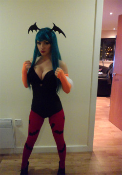 hotcosplaychicks:  Morrigan by AmiNakajima  Check out http://hotcosplaychicks.tumblr.com for more awesome cosplay