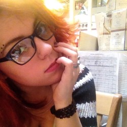 geekgothgirl:  Glasses cause my eyes are bothering me. #self #glasses #geek #nerd #redhead #minneapolis #mn #altmodel #goth #igmn #retailhell 