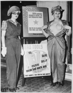 kkklo:  Modeling a hard plastic ‘safety bra’ to protect female workers at war plants, USA, 1943. 