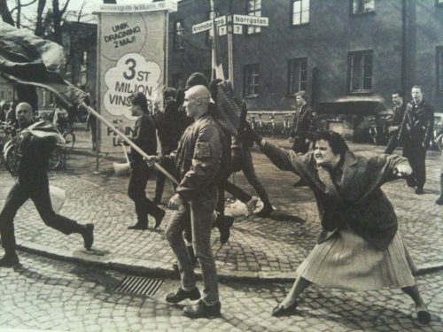 theunderestimator: A woman hitting a neo-nazi with her handbag, Sweden, 1985. The woman was reported