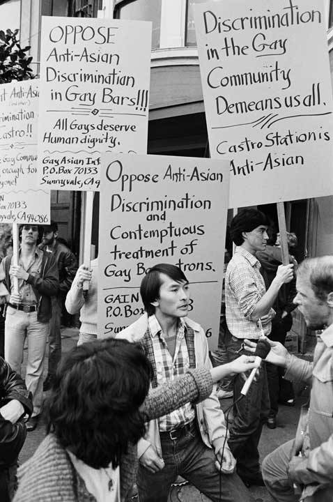 blackinasia:  (Image description: Asian americans picketing outside of a gay bar against Anti-Asian 
