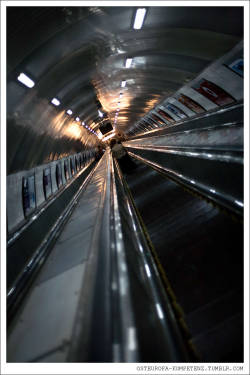 worldstreetphotography:  osteuropa-kompetenz:  Metro// Tbilissi, Georgia, 2013 everywhere in the former Soviet empire, the look and feel of the metro has preserved quite well. The escalators are like a little time machine on which you travel into the