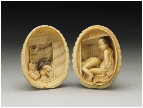 Okimono in the shape of a pine cone which opens to reveal an erotic sceneJapan, 19th C. made of ivor