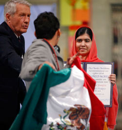 cetacea-borealis:  &ldquo;Please, Malala… Mexico&rdquo;  A man brandishing a Mexican flag stained with blood-red paint disrupted Malala’s Nobel Peace Prize acceptance ceremony on Wednesday, as the 17-year-old Pakistani activist stood on stage in