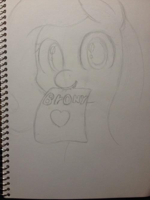 sketchashydaily:Requested by @mlpart-daily  “Can you draw Fluttershy with her holding a piece of paper in her mouth saying Brony ❤”  Sketch #2 for Day #212<3