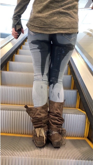 Wet ScarletLost control on the escalator in busy mall! 