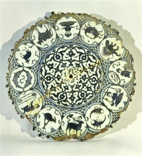 Painted enamel plate representing the twelve zodiac signs.Islamic art, 16th century, signed Abd-ol-V