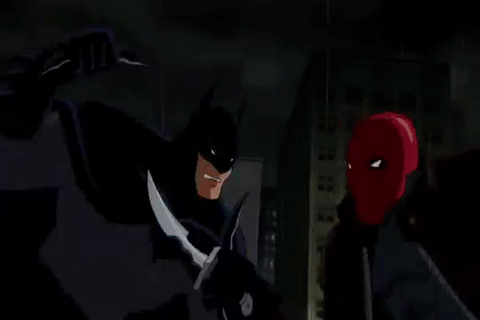 Batman: Under the Red Hood. The Red Hood slices off the Batman's utility belt with his signature knife.