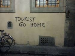 vein:  ‘tourist, go home’ when
