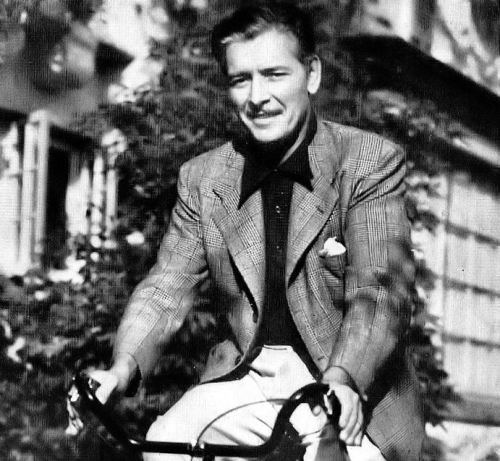 ronaldcolmans: Ronald Colman rides a bike near his home, c. 1938