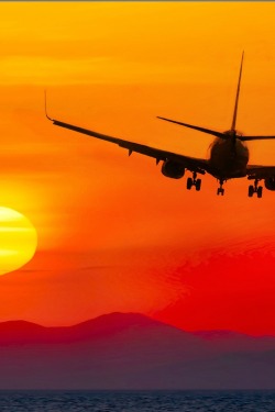 sundxwn:  Air travel at sunsetby Dimitris