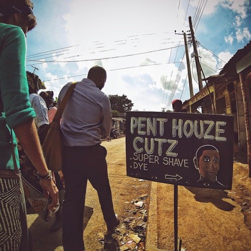 samirdave:  Now you know where @ahmedsalims gets his fresh haircut! (at Kibera Slums)