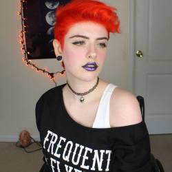 thebrokennightmare:  [image ID: five photos of Ash, a white, nonbinary person with short, bright orange hair and metallic purple lipstick and winged eyeliner. They are a left leg above-knee amputee and are wearing an off-the-shoulder sweater that says