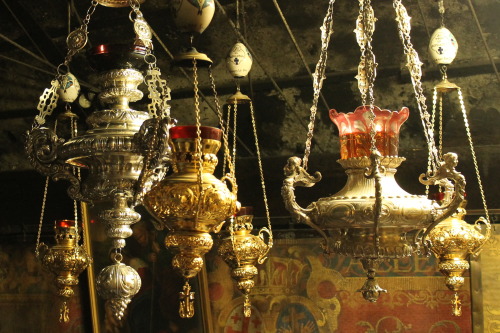 echiromani:Votive lamps burning in the Grotto of the Nativity in Bethlehem.