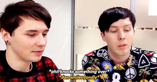 glittergradient: phil is clumsy and dan is endeared