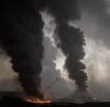 Porn photo spectrologie:Burning oil wells in Qayyarah,