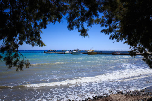 Boats moored in Plakias, and the Libyan sea.