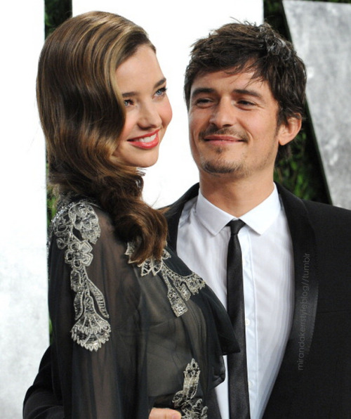 vogue-struck:  indvlge:  mirandakerrstyleblog:  at the Vanity Fair Oscars Party at the Sunset Tower Hotel with Orlando Look at the way he looks at her! Marriage over my ass  AJSHDHFJSIDJKD  best couple <3 