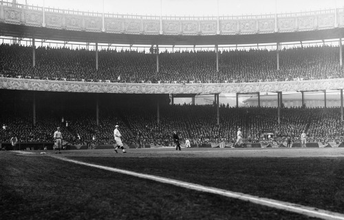 Babe Ruth of the New York Yankees in action at a packed Polo Grounds, 1921.