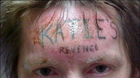 bizarreismm:  An illegal inmate tattoo reading “Katie’s Revenge” on the forehead of convicted rapist and murderer Anthony Ray Stockelman.  The tattoo was forcibly given to Stockelman while in prison by another inmate after learning that he had