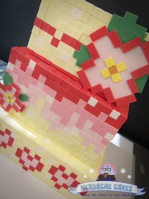 nerdachecakes: A completely 8 bit wedding cake, made from over 3,000 1 inch hand-cut squares. It too