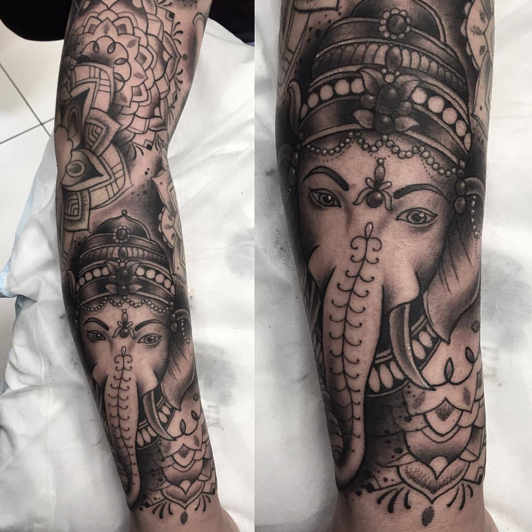 Black Ink Lord Ganesha Tattoo Design For Half Sleeve