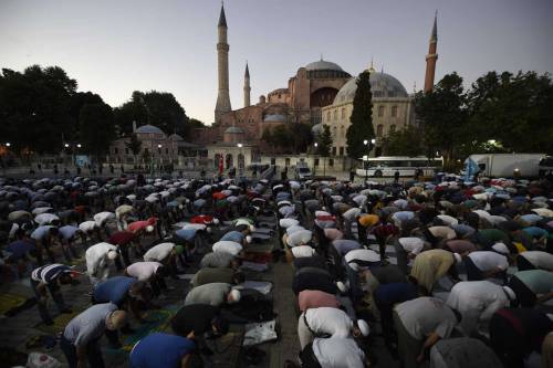 Muslims gather for evening prayers outside Hagia Sophia on Jul 10, 2020  after Turkey&rsquo