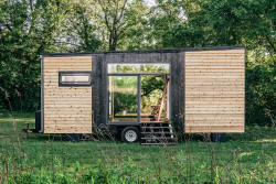 archatlas:  Alpha Tiny Home Alpha Tiny Home gets her looks from the wonderful contrast of material and style.  Its modern aesthetic is contrasted with beautiful natural, textured materials: clean modern lines and large glass windows, shou sugi ban cedar