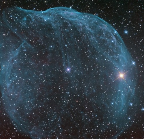 Blown by fast winds from a hot, massive star, this cosmic bubble is huge. Cataloged as Sharpless 308