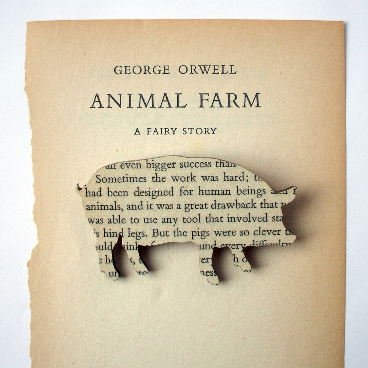 fer1972:  Handmade Brooches made from the original Book Pages by House of Iismay