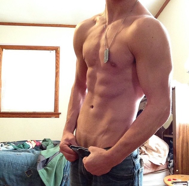randomjocks:  Nice abs and biceps with dog tags